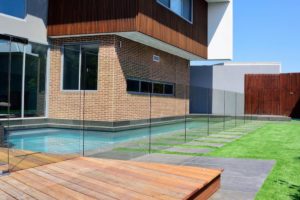 Glass pool fencing systems