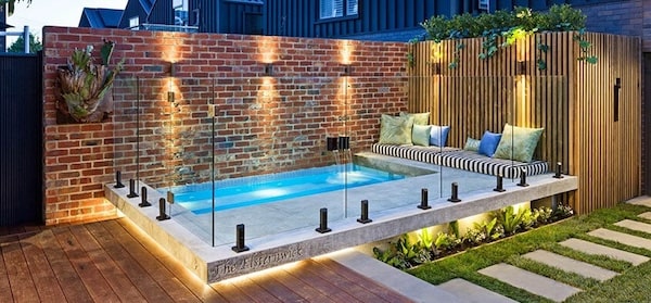 Frameless glass pool fencing installation Brighton